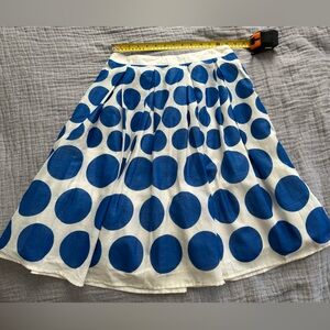 A-line skirt double-lined skirt white cotton with large blue polka dots.